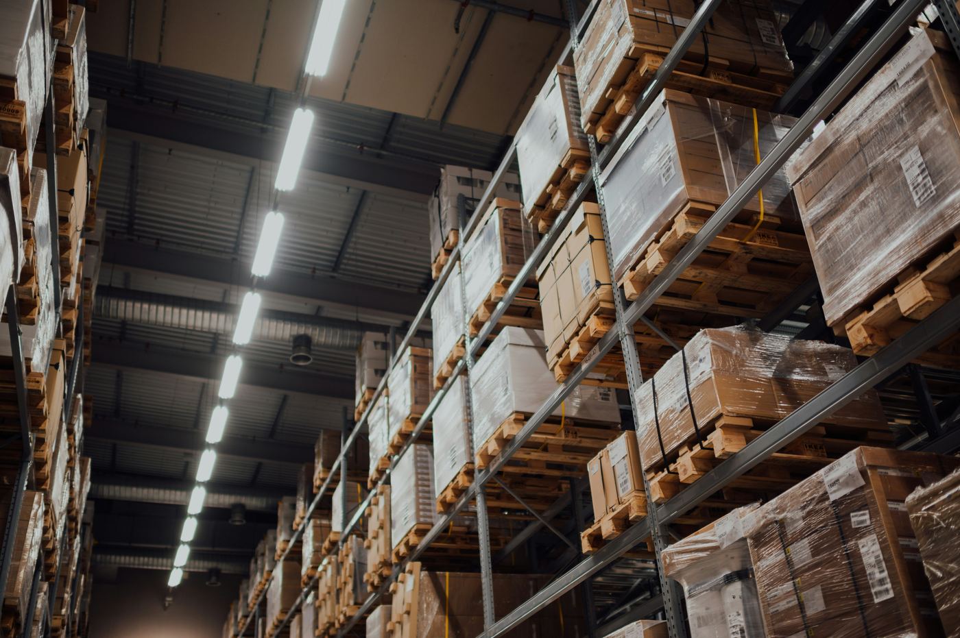 Brown cardboard boxes stacked on a warehouse rack