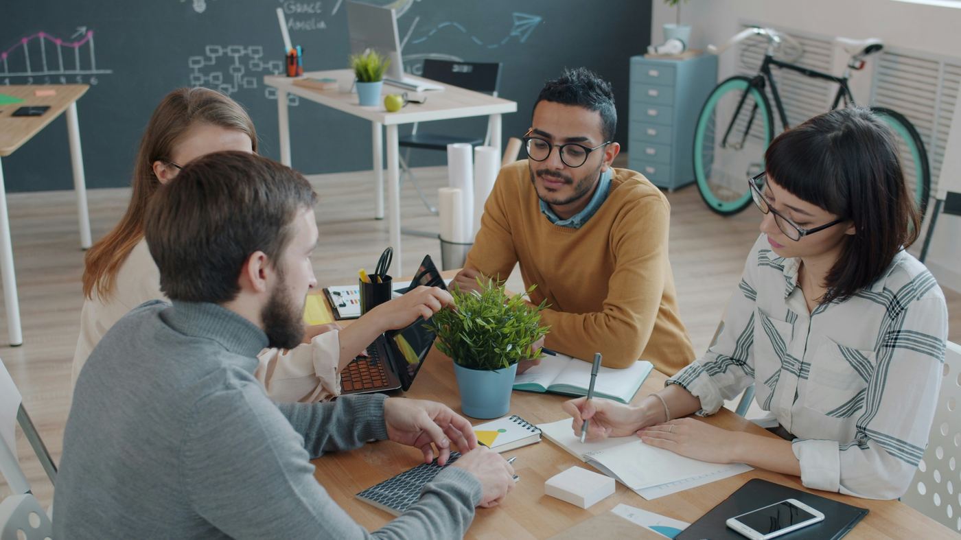 A team collaborating around a table in an office